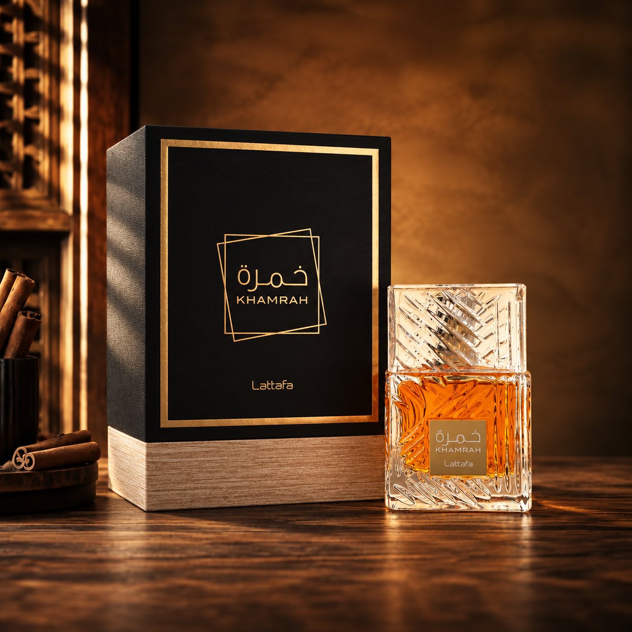 Lattafa Khamrah Cologne bottle and box in a warm studio setting